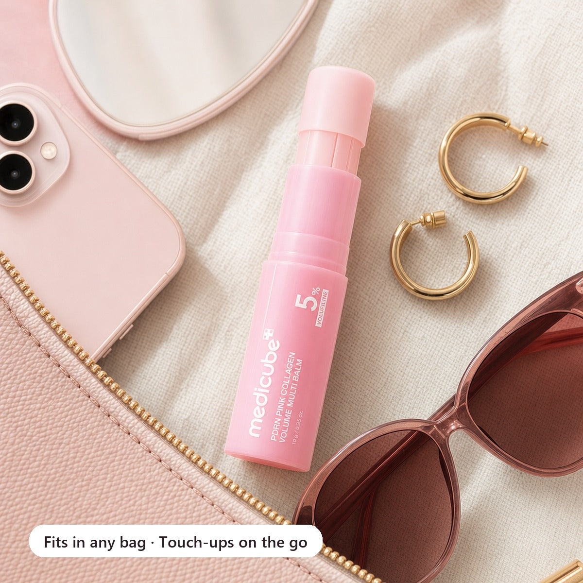 Multi balm in a makeup pouch for touch-ups on the go